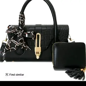 Elegant Black Crocodile-Embossed Satchel with Gold Hardware and Matching Wallet Set