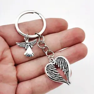 Protective Compact Lightweight Guardian Angel Wings Keychain - Zinc Alloy Silver Finish, Clip-Attached, Feather-Detailed Winged Motif, Symbolic Fashion Accessory Gift, Compact And Lightweight