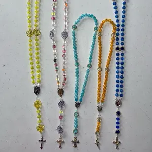 Heavenly Bloom Collection Stretchy Cord on the Go Rosaries with Blue, powdered blue, orange, yellow & flowered collared Beads and Cross Charm