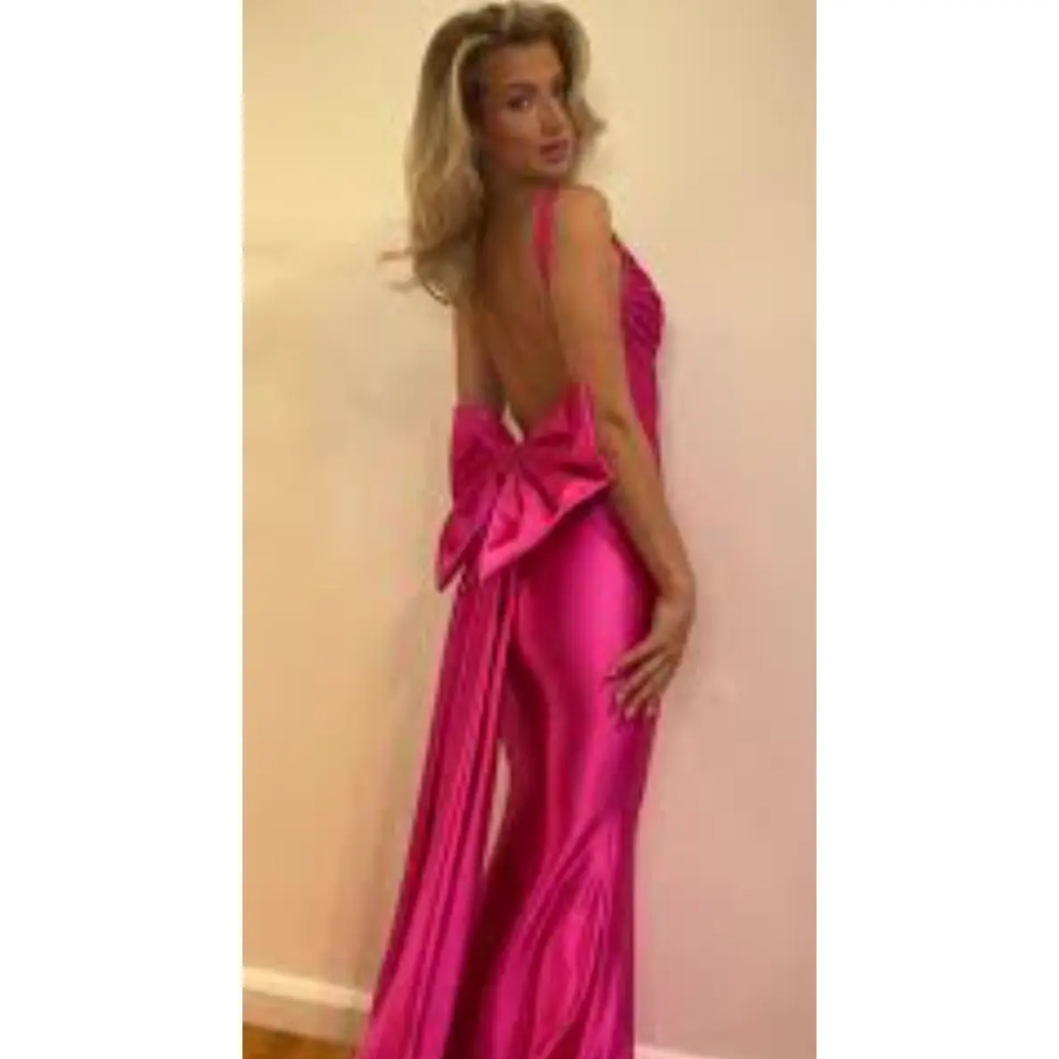 The Jovani D5304 Fuchsia Satin Corset Bow Back Gown