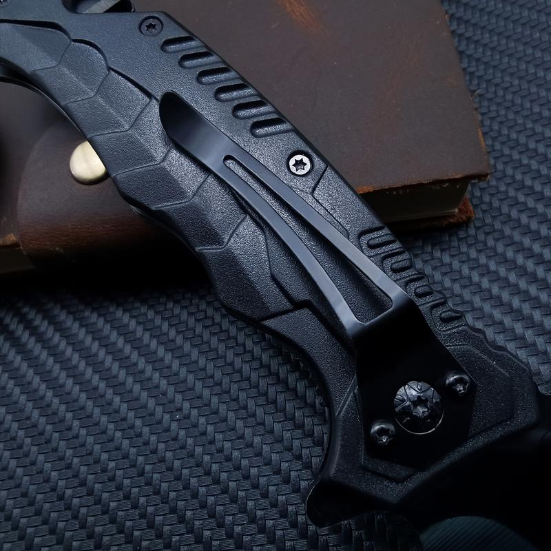 Heavy - Duty Black Folding Knife with Ergonomic Grip for Camping & Adventure