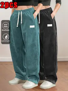 Women’s two-piece set featuring dark green corduroy; high-waisted drawstring waistline; loose wide-leg fit; side label detailing; long pants; relaxed casual style; casual trousers; suitable for home and light athletic occasions; no holiday focus; spring/a