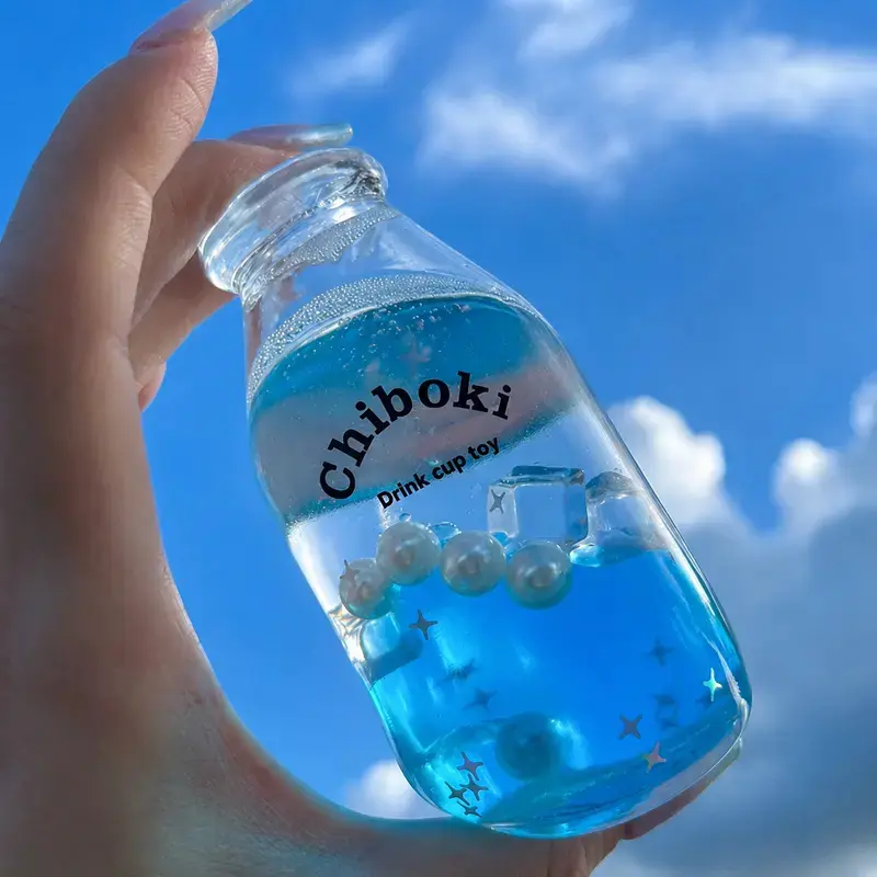 Chiboki Liquid Layer Squishy Orange Soda Bottle, Squeeze Fidget Toy Featuring Flowing Liquid Texture, Sensory Stress Relief Toy