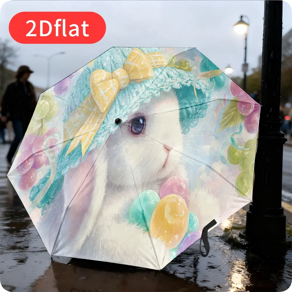 An Easter Bunny folding umbrella – featuring an adorable white bunny wearing a blue hat and holding colorful balls, lightweight and portable for travel and everyday use, with a durable canopy made of sturdy plastic and