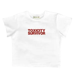 TOXICITY SURVIVOR - Baby Tee V2 - 95% Cotton 5% Elastane - Woman baby tee