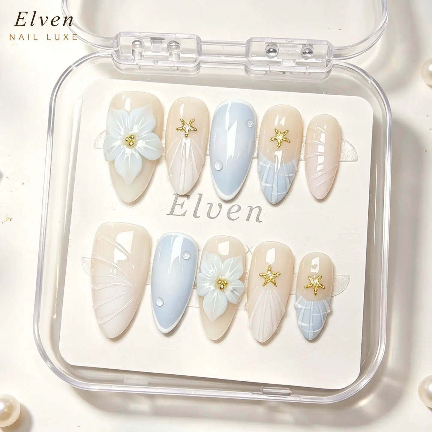 Handmade Nude Light Blue Ombre Press On Nails With 3D Flower, Gold Starfish & Line Accents, Medium Almond Reusable Fake Nails For Ocean-Inspired Summer Wear