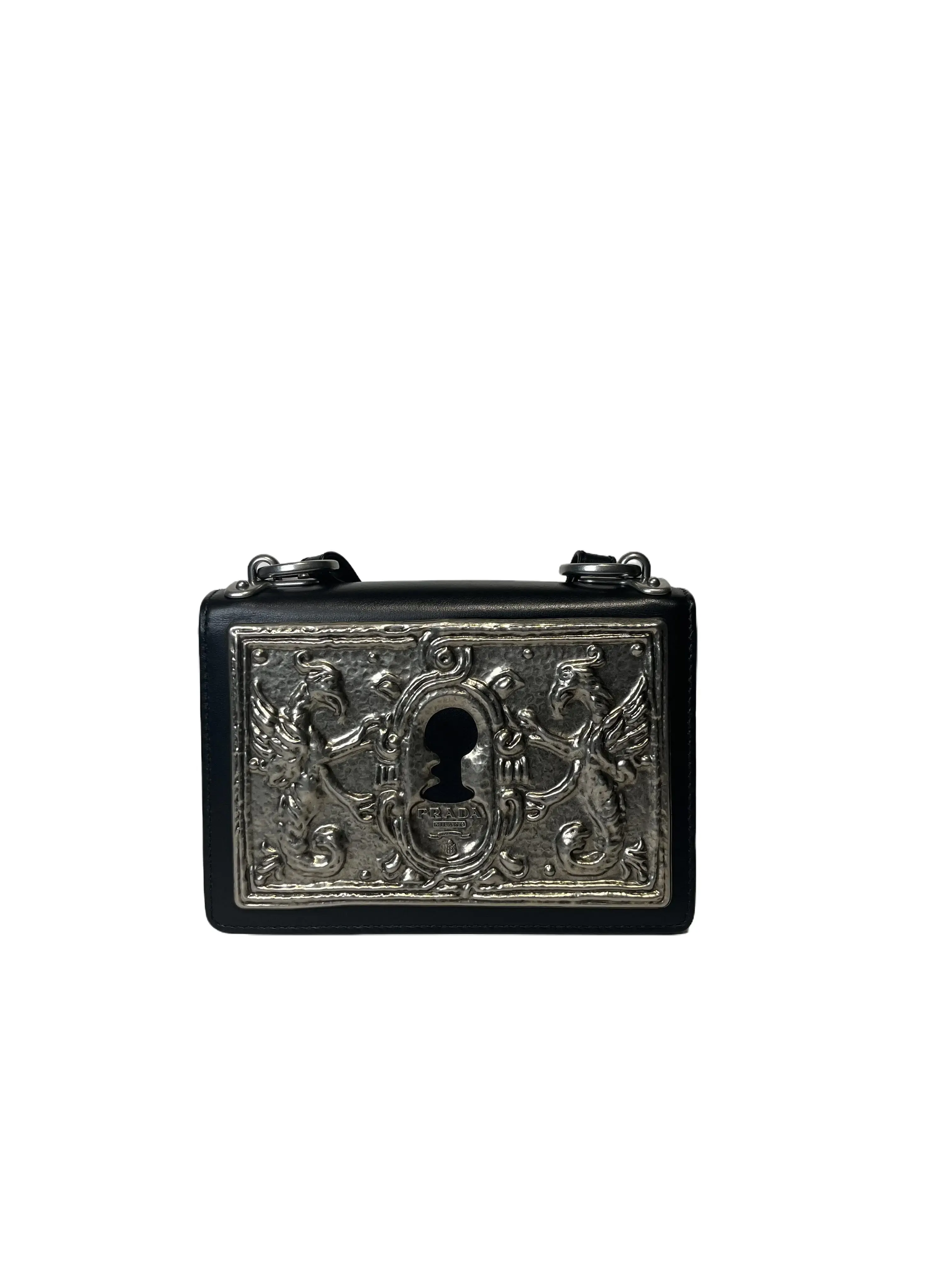 Pre-owned PRADA Black Leather Engraved Keyhole Book Bag Fashion Crossbody Luggage with 3D Baroque Relief, Antique Medieval Grimoire & Silver Accents