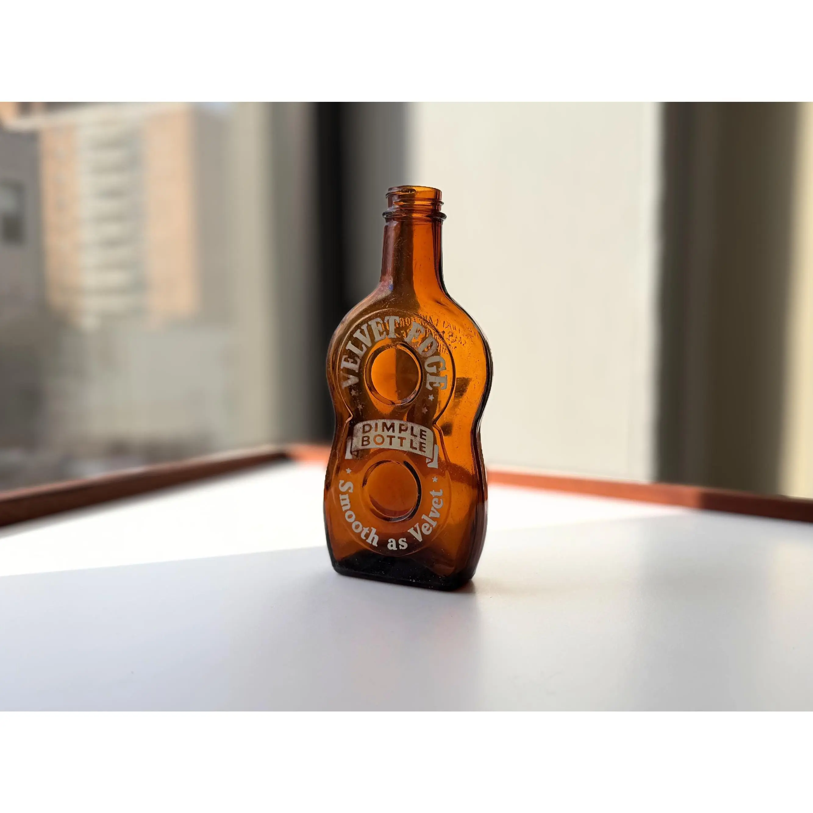 1952 Velvet Edge Dimple Bottle – Amber Glass