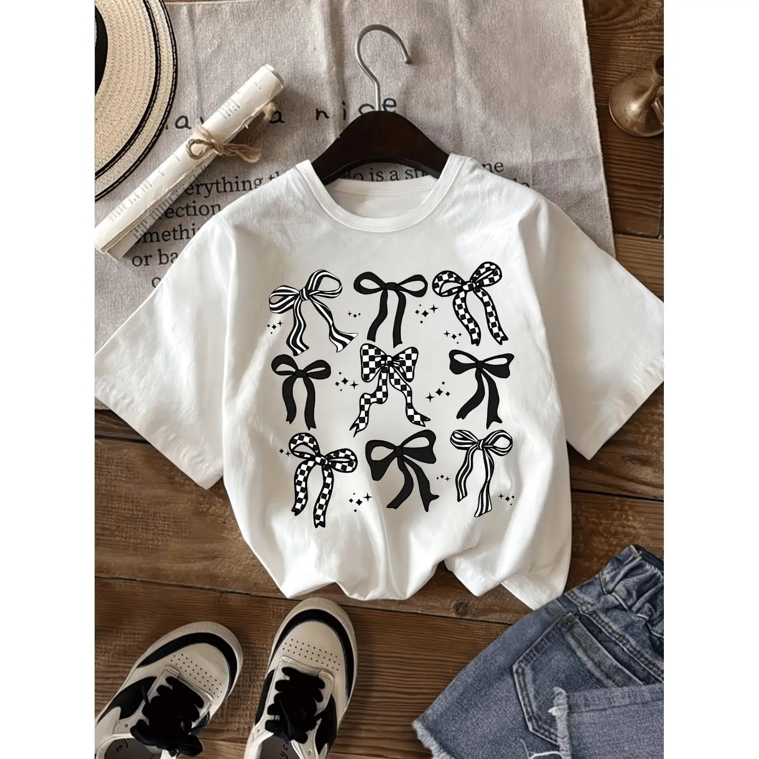 [Girls' Checkered Bow T-shirt] Trendy Black and White Checkered Bow Print Short-sleeved T-shirt for Girls - Soft and Comfortable Fabric - Casual and Versatile - Perfect for Summer Outings - Stylish Look - Affordable Clothing