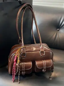 Retro classic simple Boston shoulder handbag, multi-pocket design, woven pendant embellishment, fashion exquisite versatile shoulder bag, suitable for students， office workers commuting, shopping, etc., PU tote satchel