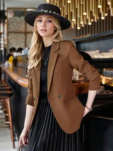 Dark brown double breasted suit jacket with three quarter sleeves and waist cinched small suit, versatile commuter women's top