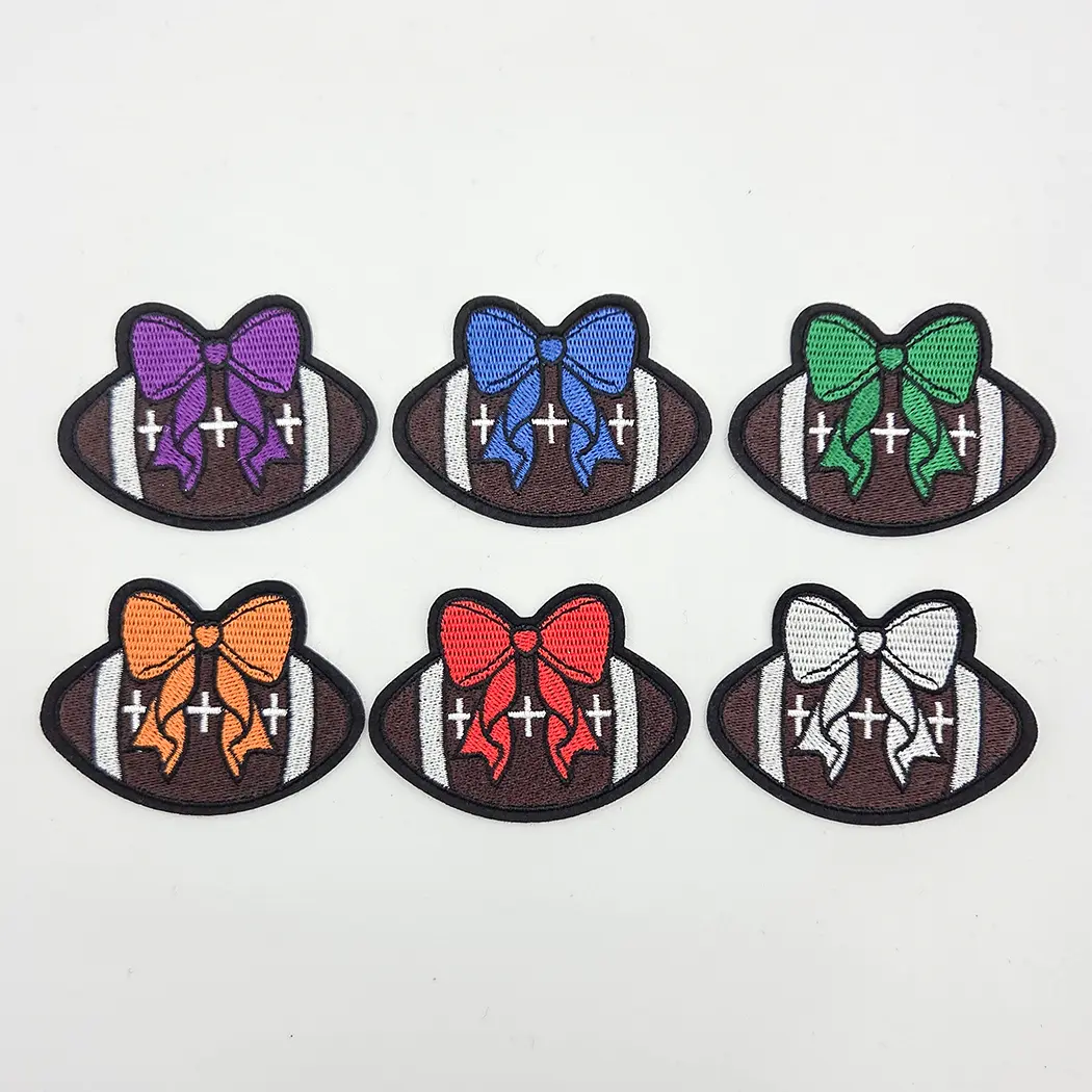 Football With Bow Embroidered HAT/POCKET Patch