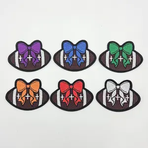 Football With Bow Embroidered HAT/POCKET Patch