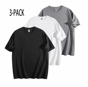 Three plus-size solid color T-shirts in black, white, and gray, made of pure cotton, crew neck style, suitable for everyday casual wear.