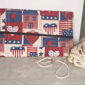 Crochet hook holder. Holds all your crochet accessories with pockets galore. Organiser Hangers Racks