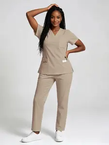 Women's Stretch Scrubs Set That Breathes!Featuring a trendy jogger style with multiple pockets, this smooth, quick-drying Workwear uniform lets you say goodbye to wrinkles & stuffiness for work and beyond. T-Shirt Coat