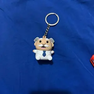 Dr. Simi llavero pastillero Keychain - Featuring a Character in a White Suit and Blue Tie