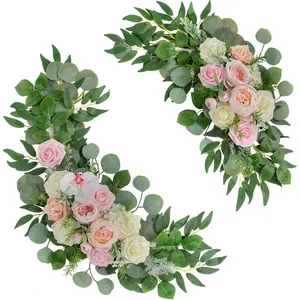 2-piece set of green leaf and pink artificial arch floral decorations, Faux flower garland, featuring a main flower composed of powder blusher peony, pink, and milky white roses, paired with vines, is ideal for wedding backdrops and home decorations