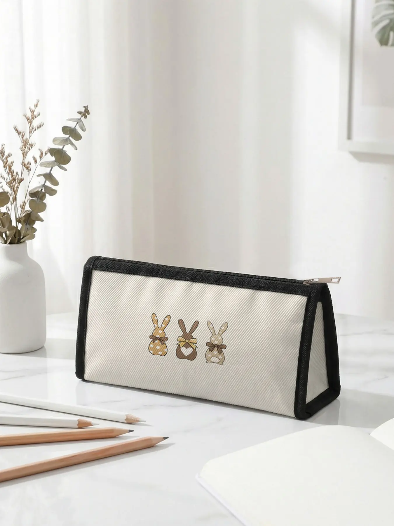 1 piece of Easter limited edition pencil case with 2D printed polka dot rabbit design, ergonomic triangular capacity for portable size|Perfect for students in class/office organization, blending festive atmosphere with practicality