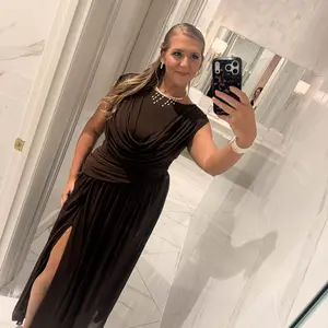 Customer wearing the Athena Gown