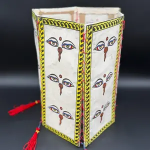 Buddhist Decor Paper with Intricate Eye Designs and Red Tassel for Spiritual Decor