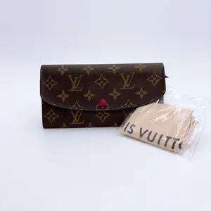 Pre-owned Louis Vuitton canvas Clutches & Wristlets Monogram Emilie Wallet
