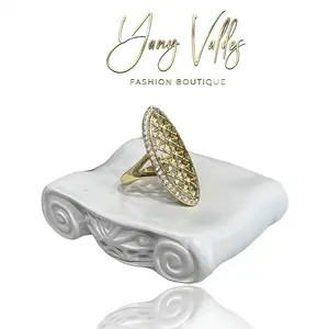 Almond-shaped ring for women,  gold plated and bordered with Zirconia stones.