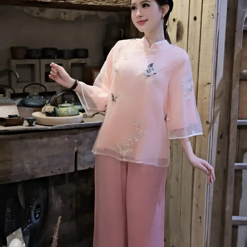 Pháp phục : Áo tơ hồ điệp kèm quần- hồng . Set top and pants