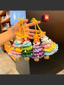 A specially designed woolen crocheted Christmas tree decoration pendant, a simulated mini Christmas tree cart for hanging Christmas gifts