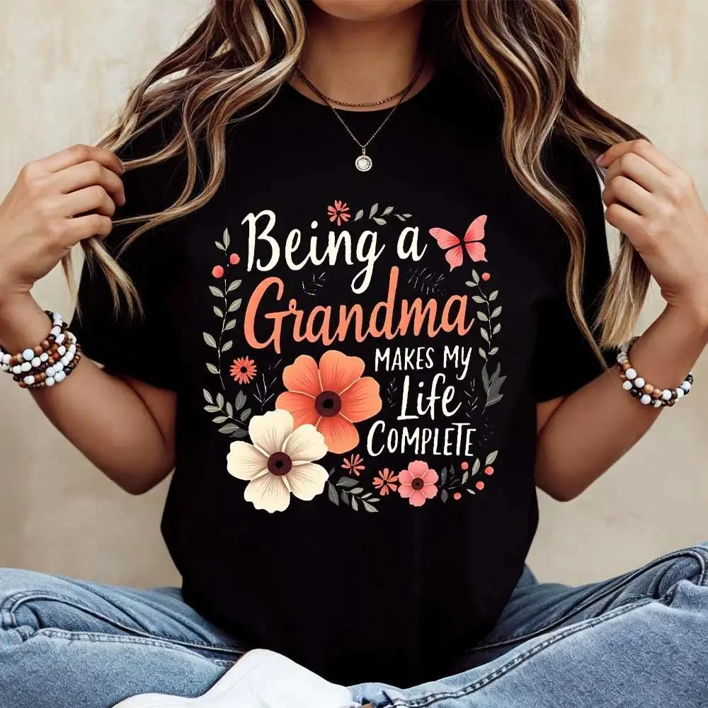 Being a Grandma Makes My Life Complete Floral Butterfly Graphic T-Shirt, Vintage Oversized  Tee, Personalized Grandma Gift for Mother's Day Birthday, Casual Retro Flower Print Shirt for Grandmother Women, Soft Comfortable Short Sleeve Top for Family