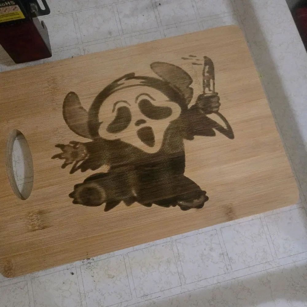 Spooky Halloween Alien Cutting Board with Engraved Ghost Design Perfect for Halloween Decor and Festive Occasions