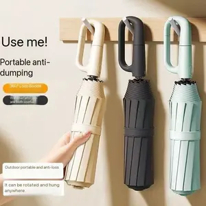 Automatic umbrella rib windproof design with loop closure, portable folding travel umbrella suitable for both men and women, thickened wind-resistant outdoor essential fashion accessory