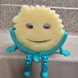 Sponge Buddy This sponge holder with drainage features a smart open draining structure that allows water to flow directly into the sink, reducing moisture buildup and odors, the raised stand and balanced legs improve airflow so your sponges dry faster