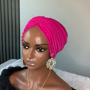 Pleated Cristal emberllished turban .with sparkling details.