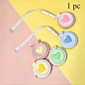 Creative heart-shaped double-sided scale Macaron mini tape measure - portable and multifunctional expandable tape measure for measuring height and body measurements.