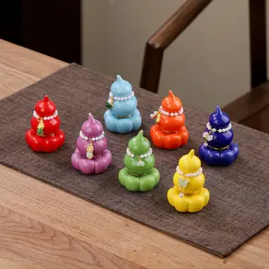 Handmade ceramic ornaments, spinning fun toys.