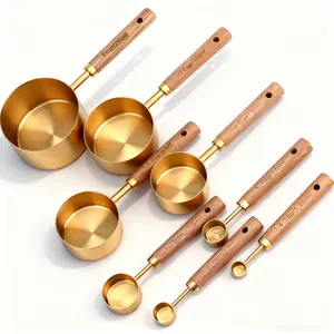 Gold measuring cups and spoons, 8-piece set, wooden handle with metric and US measurements, high-quality stainless steel, polished gold finish, dry and liquid measuring cups for cooking and baking