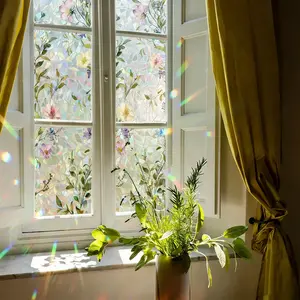 1 roll iridescent window film with floral, Flower and bird pattern, decorative privacy film for glass. Static cling, self-adhesive, removable and easy to apply. Ideal for windows and doors, enhancing home aesthetics and room décor.