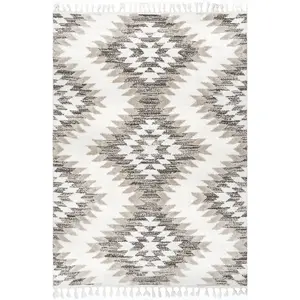 Adelade Aztec High Low Shaggy Tassel Area Rug