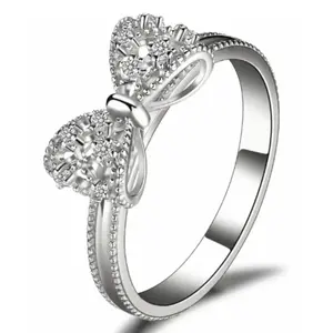 A stylish geometric bow ring—the perfect fashion accessory for women. Ideal as a gift for a girlfriend or a couple, it is also an excellent choice for everyday wear and a perfect present for Valentine's Day.