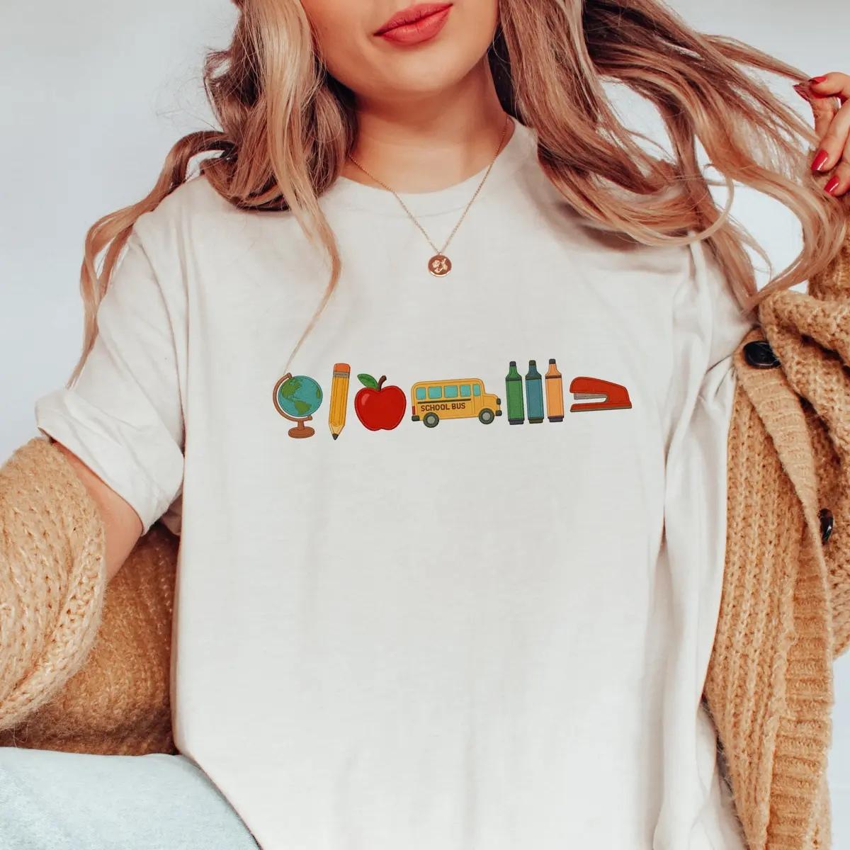 School Day Icons Adult T-shirt – Unisex Crewneck Tee with Globe Pencil Apple School Bus & Supplies Design for Educators – Gift for Teacher