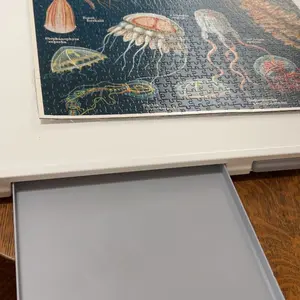 Product Review of Playboda 1000-1500 Pieces Rotating Plastic Puzzle Board with Drawers and Cover, Portable Jigsaw Puzzle Table for Adults, Lazy Susan Spinning Puzzle Boards (Patent Design) puzzle board Durable from R**)