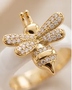 The Queen Bee Ring | Tough Luxe Collection | Ceramic + 18k Gold PVD Surgical Steel Price: $64 White Ceramic — Size 8 | Black Ceramic — Size 6