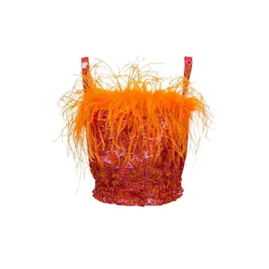 Orange flower top with feather details