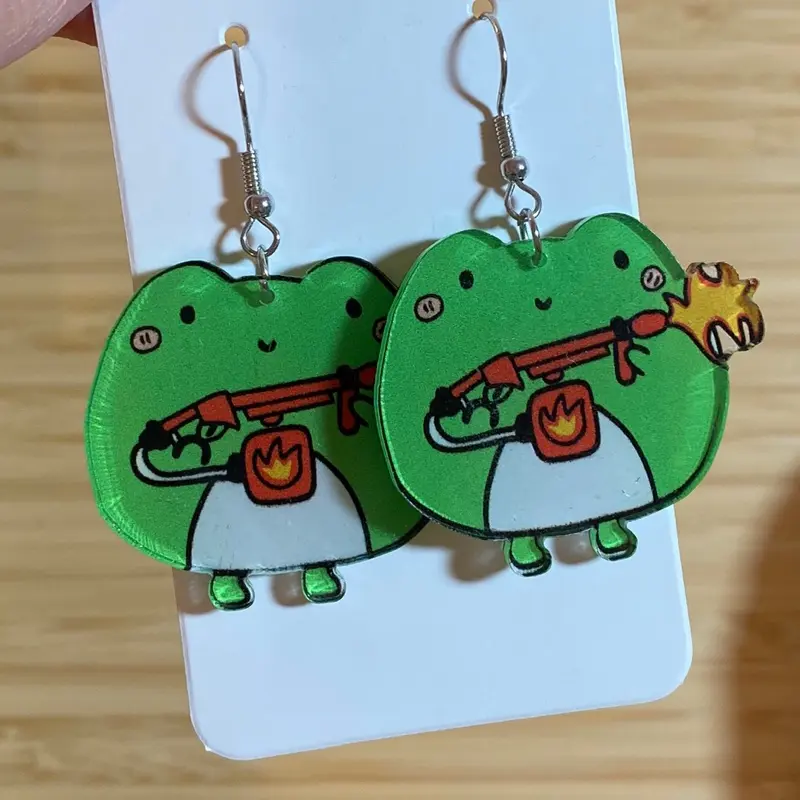Cute acrylic frog with gun earrings