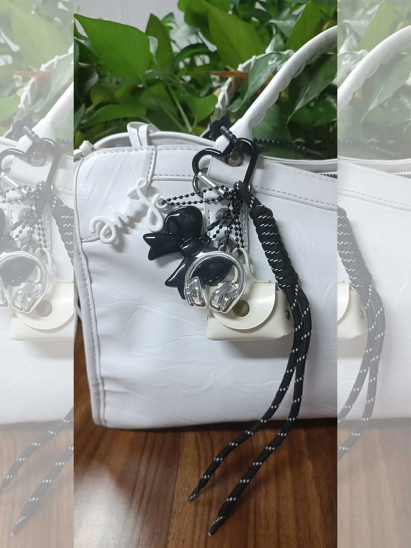 Black rope white bag