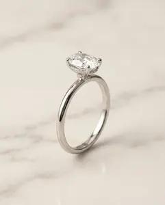 The Dolly Hidden Halo Solitaire Engagement Ring Setting for Oval Diamonds in Platinum