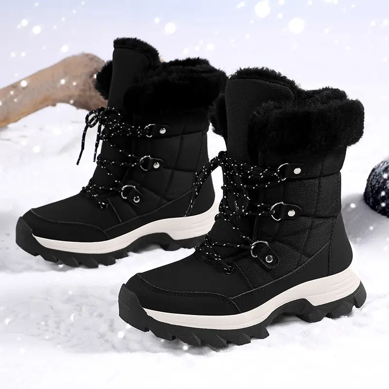 Women’s winter mid-calf snow boots with a turn-down collar and tie detail, waterproof, thickened plush for warmth, deep-lug outsole for traction—ideal for outdoor wear in winter.