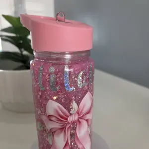 Glitter Water Bottle with Pink Bow Design and Pink Lid
