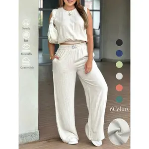 Women’s two-piece set featuring a solid-color vest and wide-leg pants—casual, fashionable, comfortable, and breathable. Suitable for everyday outdoor wear; summer women’s apparel. SuitsGARMENTARY